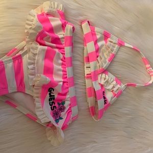 Pink and white striped swimsuit.